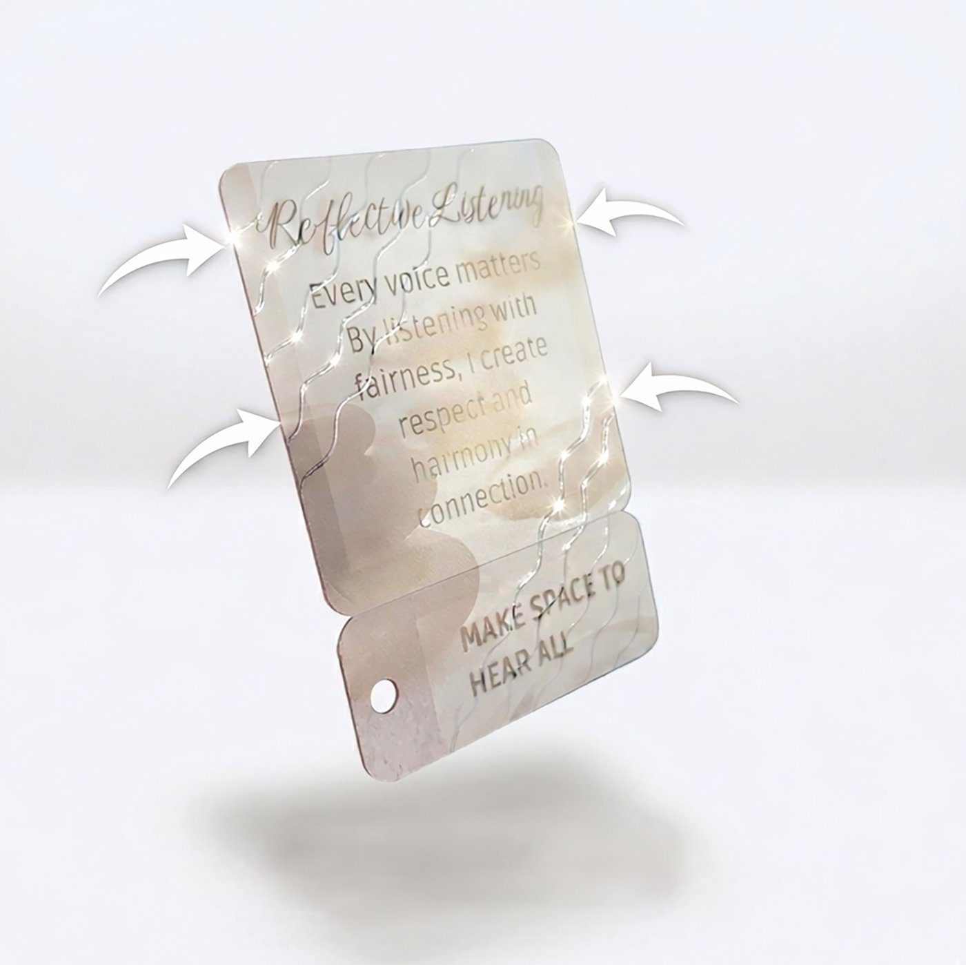 Close-up of the raised UV wave texture on a Reflective Listening affirmation card